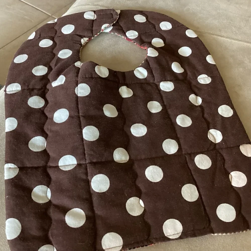 NWT. Handcrafted reversible, baby bib in brown and green shirting materials.